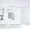 Janome HD-3000 heavy-duty mechanical sewing machine shown with its included protective hard shell carrying case near Wake Forest, NC.