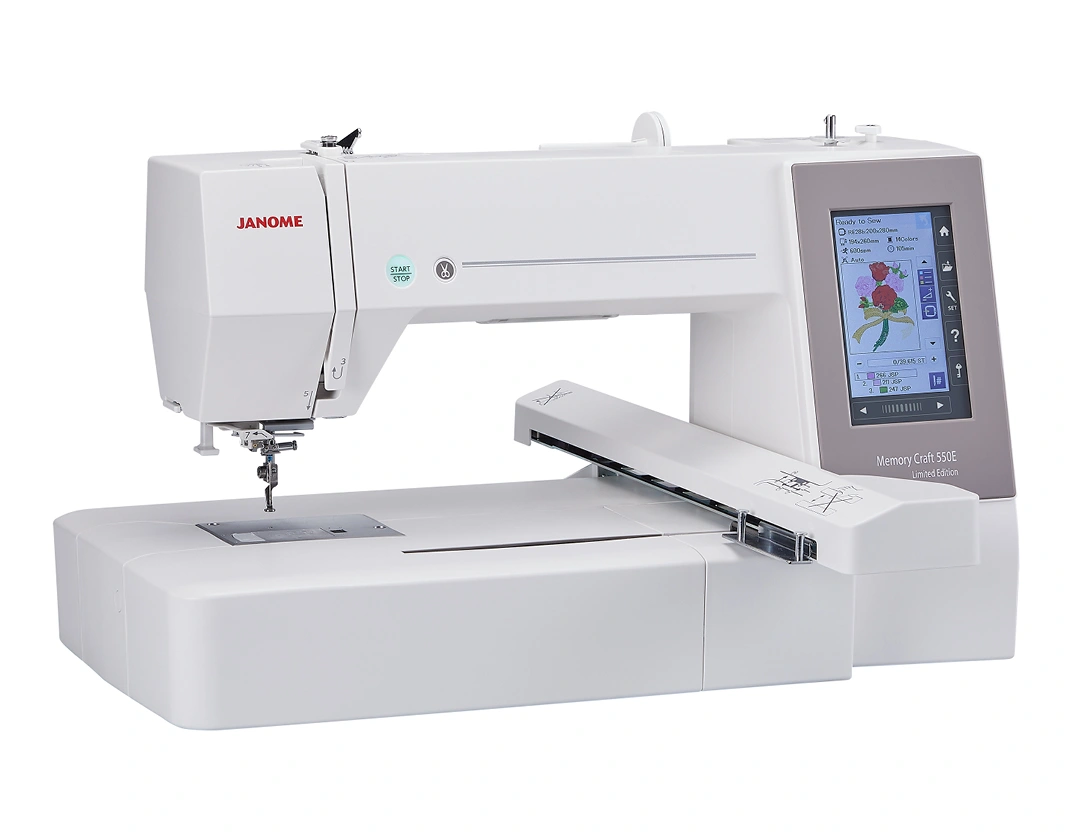 Close-up of the bright full-color computerized LCD touchscreen on a Janome 550E Limited Edition showing layout editing tools for a Triangle NC custom apparel maker.