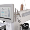 Janome Quilt Maker Pro 20 integrated 7-inch color touch screen interface showing stitch regulation modes near Wake Forest, NC.