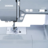 Close-up of the Janome Loft 100 backlit LCD screen displaying interactive stitch selection settings near Raleigh, NC.