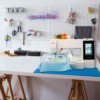 Janome Memory Craft 500E highlighting PC-compatible AcuStitch software download and USB design transfer port serving Wilmington, NC.
