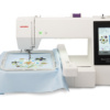 Janome Memory Craft 500E showcasing the massive 7.9 inch by 11 inch RE28b embroidery hoop expansion field near Raleigh, NC.