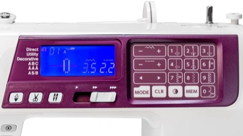 Close-up of the Janome 4120QDC-G backlit LCD informational screen and control touchpad near Raleigh, NC.