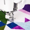 Janome CM8 Accurate Stitch Regulator system providing automated stitch regulation during free-motion quilting serving Wilmington, NC.