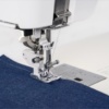 Janome Continental M8 AcuFeed Flex Plus dual feed system handling heavy layered denim sewing tasks near Wake Forest , NC.