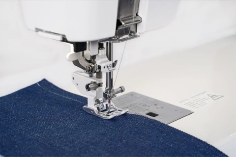 Janome Continental M8 AcuFeed Flex Plus dual feed system handling heavy layered denim sewing tasks near Wake Forest , NC.