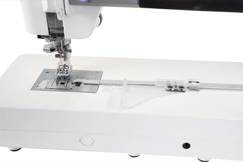 Janome Continental M8 professional seamless flatbed casting 13.5 inches of throat space with an attached electronic cloth guide serving Southern VA.