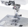 Janome Horizon 9410QC built-in Superior Needle Threader 2 and 7-piece feed dog system configuration near Clayton, NC.