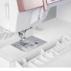 Janome Horizon Memory Craft 9410QC showing 11 inches of spacious bed throat workspace layout near Wake Forest, NC.