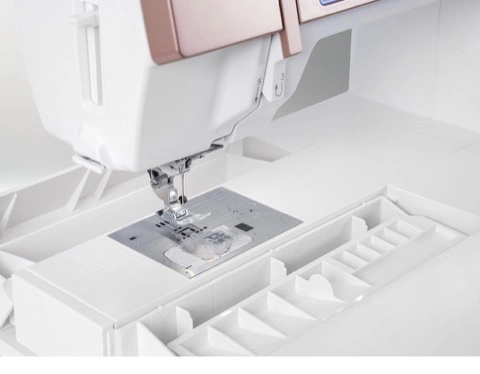 Janome Horizon Memory Craft 9410QC showing 11 inches of spacious bed throat workspace layout near Wake Forest, NC.