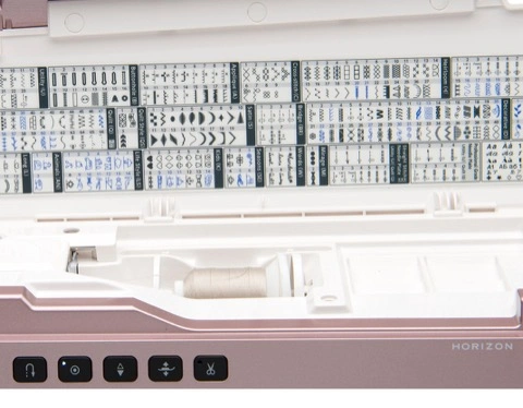 Janome MC9410QC flip-top accessory lid stitch selection library showing 300 built-in options near Danville and Southern VA.