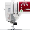 Janome Memory Craft 6650 flip-up lid showcasing the removable stitch reference chart available for delivery near Wilmington and Coastal NC.