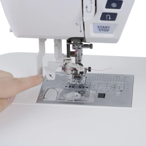 Close-up of the Janome Skyline S6 built-in advanced one-hand needle threader serving Wilmington and Coastal NC.