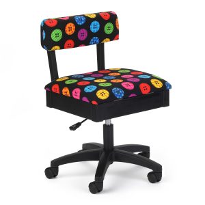 Bright Buttons Hydraulic Sewing Chair Buttons, buttons, who’s got the Bright Buttons? We do, and you can too. This heavy-duty upholstery fabric dazzles with brightly colored and patterned buttons scattered playfully across a black field. The chair’s adjustable seat (seat height moves between 18 and 22 inches), plush cushions, lumbar support and five-star 360° swivel base make it easy to sew ergonomically, and the seat’s secret storage compartment is perfect for stashing notions or an emergency button hook.