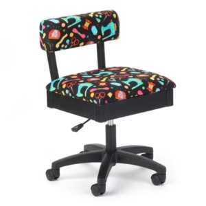 Arrow Sewing Notions hydraulic chair featuring vintage tool print fabrics adjusted for an ergonomic quilting space in the Triangle NC area.