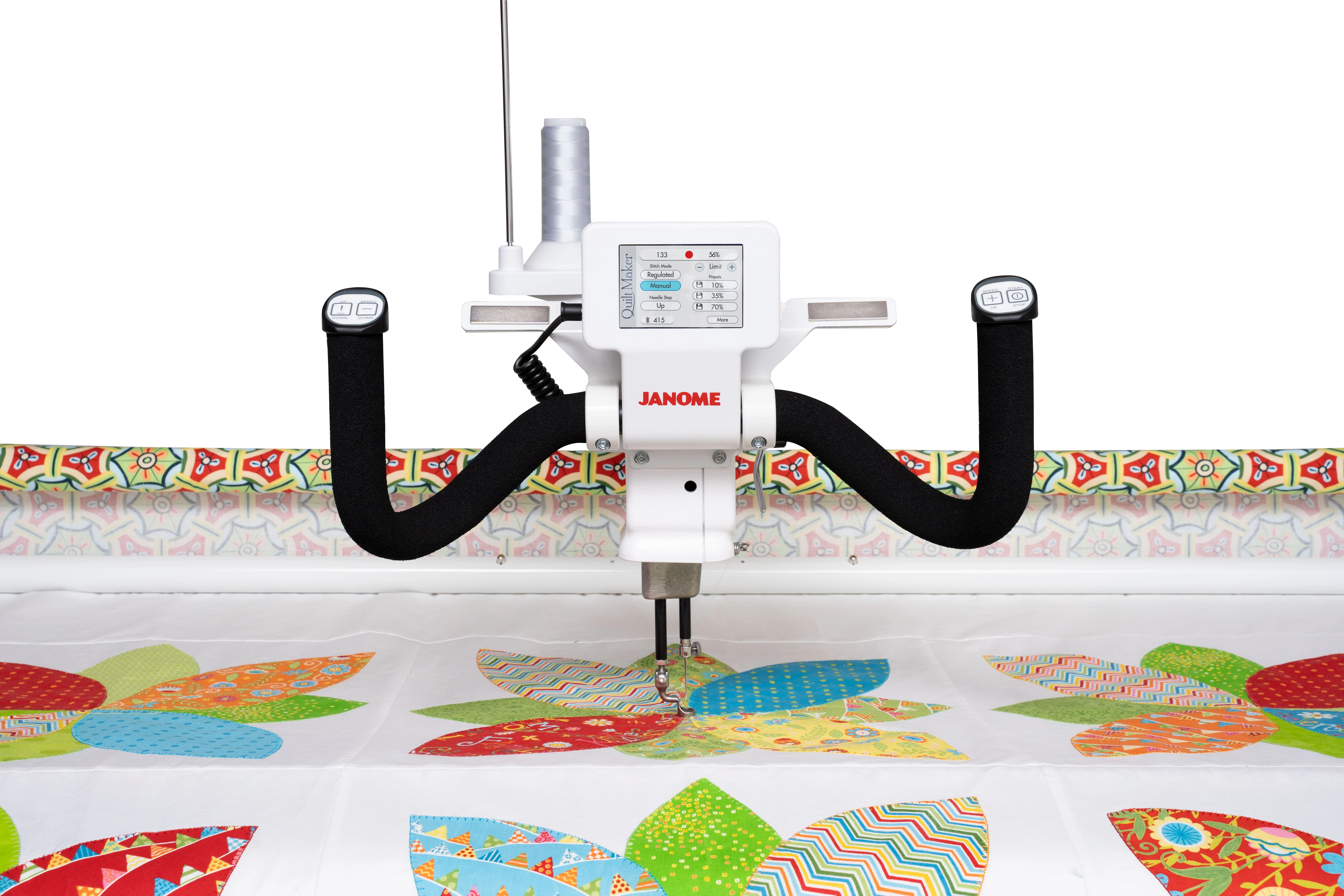 Close up view of a custom quilt pattern being stitched on a Janome Quilt Maker Pro 18 longarm machine, serving quilters across Raleigh and Wake Forest