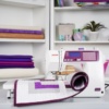 Close-up of the purple Janome 5300QDC backlit LCD screen display showing 300 built-in sewing stitches near Raleigh, NC.