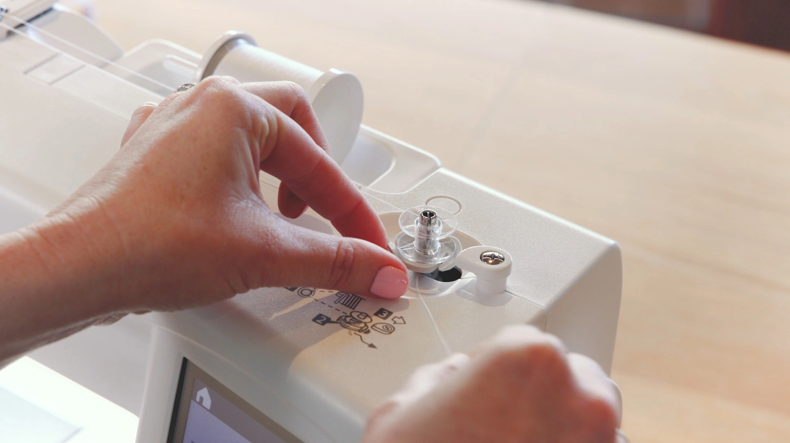 Janome MC100E sewing machine showcasing the built-in USB flash drive port for custom design transfer serving Wilmington and Coastal NC.