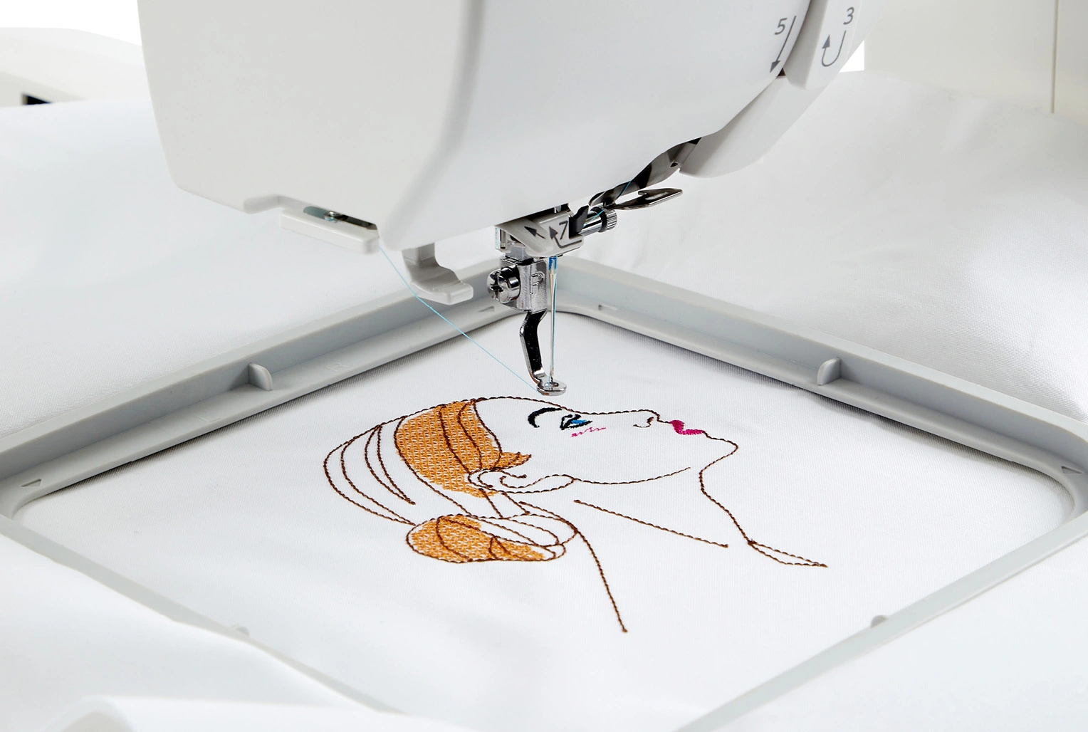 Janome Memory Craft 100E setup highlighting its standard embroidery hoop footprint and bed alignment layout near Wake Forest, NC.