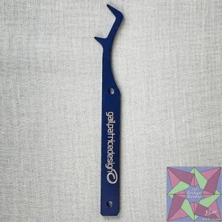Secure final cover or chain stitches effortlessly with the Locking Fork! This handy tool skillfully grabs needles, minimizing breakage. Made of: Aluminum Use: Securing Serger Stitches Included: Locking Fork, Instruction Kit Size: 4-1/2in x 1in