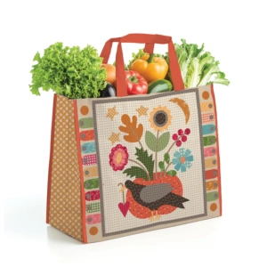 Lori Holt Baked With Love Vinyl Tote bag by Riley Blake Designs on display at The Broken Needle serving North Carolina and Southern Virginia.