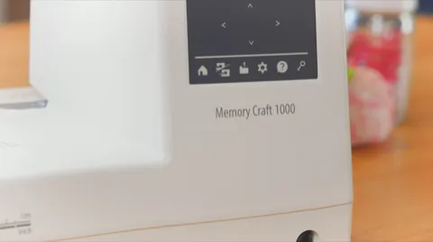 Close-up of the Janome Memory Craft 1000 SQ14e embroidery hoop frame available near Raleigh, NC.