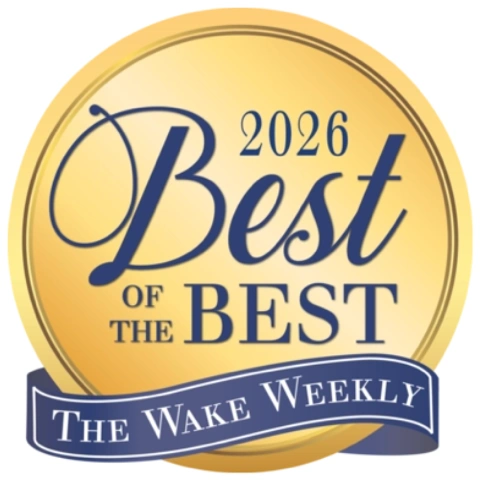 The Wake Weekly Best of the Best 2026 local business winner badge on display at The Broken Needle showroom.