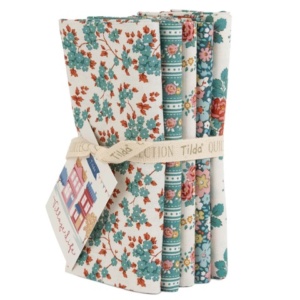 Tilda Fabrics Village Life premium quilting Fat Quarter bundle collection on display at The Broken Needle store serving local North Carolina creators.