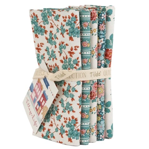 Tilda Fabrics Village Life premium quilting Fat Quarter bundle collection on display at The Broken Needle store serving local North Carolina creators.