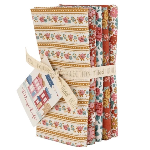 Tilda Fabrics Village Life premium quilting Fat Quarter bundle collection on display at The Broken Needle store serving local North Carolina creators.